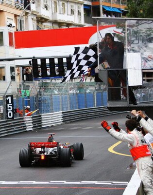 MONTE CARLO, MONACO - MAY 25:  Lewis Hamilton of Great Britain and McLaren Mercedes crosses the finish line to win the Monaco Formula One Grand Prix at the Monte Carlo Circuit on May 25, 2008 in Monte Carlo, Monaco.  (Photo by Paul Gilham/Getty Images)
