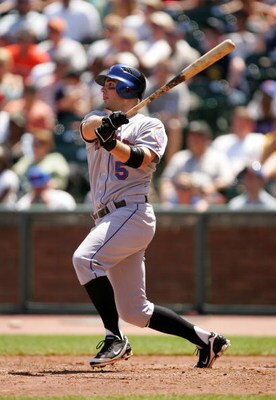 SAN FRANCISCO - MAY 16:  David Wright #5 of the New York Mets hits a two-run double to go up 6-3 in the fifth inning of their game against the San Francisco Giants at AT&T Park on May 16, 2009 in San Francisco, California.  The Mets won 9-6.  (Photo by Ez