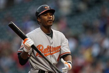 ARLINGTON, TX - APRIL 15:  Adam Jones of the Baltimore Orioles at bat while wearing jersey #42 to commemorate Jackie Robinson day during a game against the Texas Rangers on April 15, 2009 at Rangers Ballpark in Arlington, Texas.  (Photo by Ronald Martinez