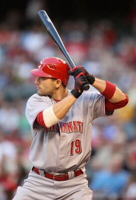 PHOENIX - MAY 12:  Joey Votto #19 of the Cincinnati Reds bats against the Arizona Diamondbacks during the major league baseball game at Chase Field on May 12, 2009 in Phoenix, Arizona.  The Reds defeated the Diamondbacks 3-1.  (Photo by Christian Petersen