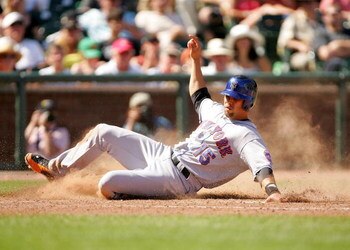 SAN FRANCISCO - MAY 16:  Carlos Beltran #15 of the New York Mets scores on a Fernando Tatis sac-fly in the ninth inning of their game against the San Francisco Giants at AT&T Park on May 16, 2009 in San Francisco, California.  The Mets won 9-6.  (Photo by