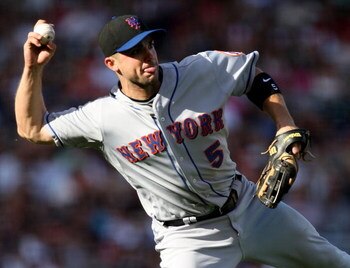 SAN FRANCISCO - MAY 17:  David Wright #5 of the New York Mets throws out Aaron Rowand of the San Francisco Giants during a Major League Baseball game on May17, 2009 at AT&T Park in San Francisco, California.  (Photo by Jed Jacobsohn/Getty Images)