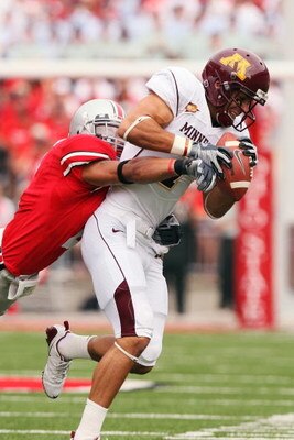 COLUMBUS, OH - SEPTEMBER 27:  Wide receiver Eric Decker #7 of the Minnesota Golden Gophers holds onto a pass reception as Kurt Coleman #4 of the Ohio State Buckeyes makes the tackle on September 27, 2008 at Ohio Stadium in Columbus, Ohio.  (Photo by Jamie