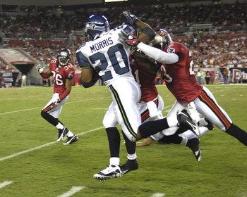 TAMPA, FL - OCTOBER 19: Running back Maurice Morris #20 of the Seattle Seahawks rushes upfield against the Tampa Bay Buccaneers at Raymond James Stadium on October 19, 2008 in Tampa, Florida. (Photo by Al Messerschmidt/Getty Images)