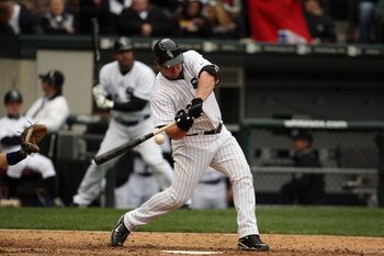 CHICAGO - APRIL 29:  Carlos Quentin #20 of the Chicago White Sox bats against the Seattle Mariners during the game on April 29, 2009 at U.S. Cellular Field in Chicago, Illinois. (Photo by Jonathan Daniel/Getty Images) 