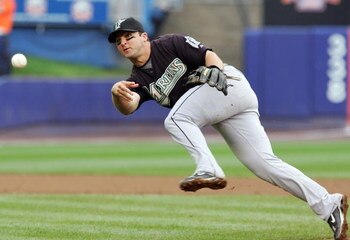 NEW YORK - SEPTEMBER 28:  Dan Uggla #6 of the Florida Marlins throws to first for an eigth inning out against the New York Mets during the last regular season baseball game ever played in Shea Stadium on September 28, 2008 in the Flushing neighborhood of 
