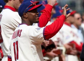 PHILADELPHIA - APRIL 08:  Jimmy Rollins #11 of the Philadelphia Phillies looks at his World Series ring during a ceremony prior to the game against the Atlanta Braves at Citizens Bank Park on April 8, 2009 in Philadelphia, Pennsylvania.  (Photo by Nick La