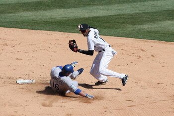 CHICAGO - APRIL 7: Alexei Ramirez #10 of the Chicago White Sox tags out Billy Butler #16 of the Kansas City Royals during the Opening Day game on April 7, 2009 at U.S. Cellular Field in Chicago, Illinois. The White Sox defeated the Royals 4-2. (Photo by J
