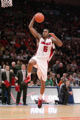 NEW YORK - MARCH 14: Earl Clark #5 of the Louisville Cardinals makes a layup against the Syracuse Orange during the championship game of the Big East Tournament at Madison Square Garden on March 14, 2009 in New York City. (Photo by: Michael Heiman/Getty