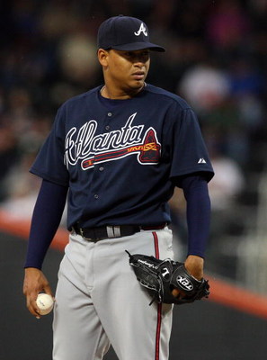 NEW YORK - MAY 12:  Jair Jurrjens #49 of the Atlanta Braves throws a pitch against the New York Mets on May 12, 2009 at Citi Field in the Flushing neighborhood of the Queens borough of New York City. The Mets defeated the Braves 4-3 in ten innings.  (Phot
