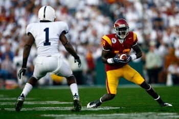 PASADENA, CA - JANUARY 01:  Damian Williams #18 of the USC Trojans goes up against A.J. Wallace #1 of the Penn State Nittany Lions during the 95th Rose Bowl Game presented by Citi on January 1, 2009 at the Rose Bowl in Pasadena, California.  (Photo by Jef