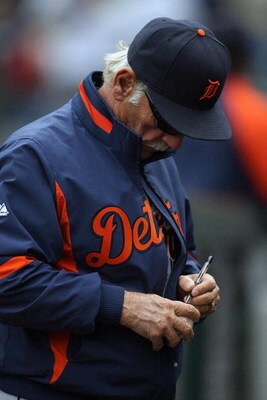 SEATTLE - APRIL 19:  Manager Jim Leyland of the Detroit Tigers signs a baseball before the game against the Seattle Mariners on April 19, 2009 at Safeco Field in Seattle, Washington. (Photo by Otto Greule Jr/Getty Images)