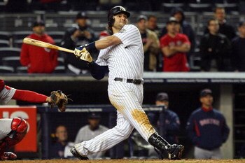 NEW YORK - MAY 04:  Nick Swisher #33 of the New York Yankees bats against the Boston Red Sox on May 4, 2009 at Yankee Stadium in the Bronx borough of New York City. The Red Sox defeated the Yankees 6-4.  (Photo by Jim McIsaac/Getty Images)