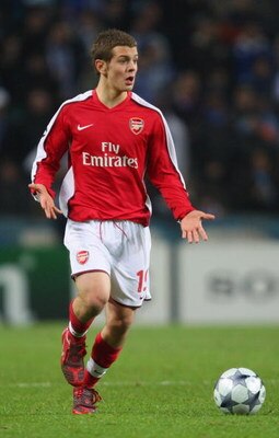PORTO, PORTUGAL - DECEMBER 10:  Jack Wilshere of Arsenal runs with the ball during the UEFA Champions League group A match between FC Porto and Arsenal at the Estadio Do Dragao Stadium on December 10, 2008 in Porto Portugal.  (Photo by Mark Thompson/Getty