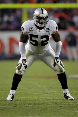 DENVER - NOVEMBER 23:  Linebacker Kirk Morrison #52 of the Oakland Raiders defends against the Denver Broncos during week 12 NFL action at Invesco Field at Mile High on November 23, 2008 in Denver, Colorado. The Raiders defeated the Broncos 31-10.  (Photo