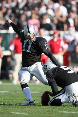 OAKLAND, CA - NOVEMBER 30:  Sebastian Janikowski #11 of the Oakland Raiders kicks a field goal against the Kansas City Chiefs during an NFL game on November 30, 2008 at the Oakland-Alameda County Coliseum in Oakland, California. (Photo by Jed Jacobsohn/Ge