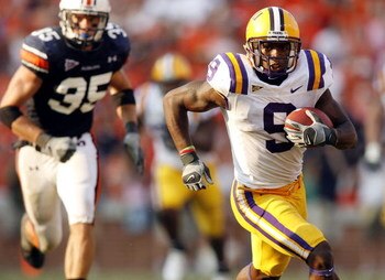 AUBURN, AL - SEPTEMBER 16:  Early Doucet #9 of the Louisiana State University Tigers runs around Will Herring #35 of the Auburn University Tigers September 16, 2006 at Jordan-Hare Stadium in Auburn, Alabama.  Auburn defeated LSU 7-3.  (Photo by Chris Gray