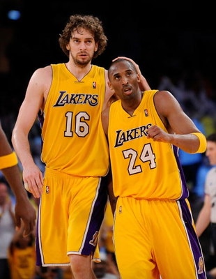 LOS ANGELES, CA - MAY 19:  (L-R) Pau Gasol #16 and Kobe Bryant #24 of the Los Angeles Lakers walk to the bench late in the fourth quarter against the Denver Nuggets in Game One of the Western Conference Finals during the 2009 NBA Playoffs at Staples Cente