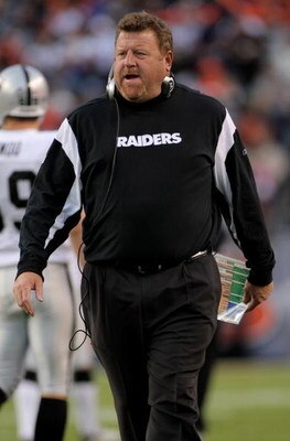 DENVER - NOVEMBER 23:  Head coach Tom Cable of the Oakland Raiders leads his team against the Denver Broncos during week 12 NFL action at Invesco Field at Mile High on November 23, 2008 in Denver, Colorado. The Raiders defeated the Broncos 31-10.  (Photo 