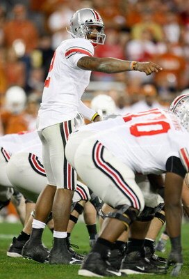 GLENDALE, AZ - JANUARY 05:  Terrelle Pryor #2 of the Ohio State Buckeyes snaps the ball against the Texas Longhorns during the Tostitos Fiesta Bowl Game on January 5, 2009 at University of Phoenix Stadium in Glendale, Arizona.  (Photo by Jeff Gross/Getty 