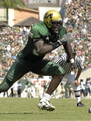 TAMPA, FL - OCTOBER 13:  Defensive end George Selvie #95 of the University of South Florida Bulls rushes the pocket against the University of Central Florida Knights on October 13, 2007 at Raymond James Stadium in Tampa, Florida. The Bulls won 64-12.  (Ph