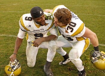 ATHENS, GA - NOVEMBER 29:  Quarterback Josh Nesbitt #9 and linebacker James Liipfert of the Georgia Tech Yellow Jackets celebrate the victory over the Georgia Bulldogs after the game at Sanford Stadium on November 29, 2008 in Athens, Georgia.  The Yellow 