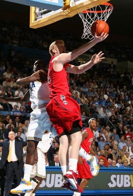 WESTWOOD, CA - JANUARY 15:  Chase Budinger #34 of the Arizona Wildcats drives to the basket past Darren Collison #2 of the UCLA Bruins during the college basketball game at Pauley Pavilion on January 15, 2009 in Westwood, California. The Bruins defeated t