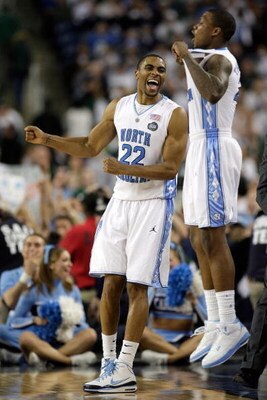 DETROIT - APRIL 06:  Wayne Ellington #22 and Deon Thompson #21 of the North Carolina Tar Heels celebrate in the final minute of their 89-72 win against the Michigan State Spartans during the 2009 NCAA Division I Men's Basketball National Championship game