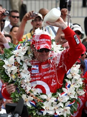 INDIANAPOLIS - MAY 25:  Scott Dixon driver of the #9 Target Chip Ganassi Racing Honda Dallara pours milk on his head to celebrate winning the IndyCar Series 92nd running of the Indianapolis 500 at Indianapolis Motor Speedway on May 25, 2008 in Indianapoli