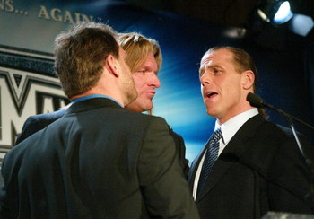 NEW YORK - MARCH 11:  (L-R) Wrestlers Chris Benoit, Triple H and Shawn Michaels attend a press conference to promote Wrestlemania XX at Planet Hollywood March 11, 2004 in New York City.  (Photo by Peter Kramer/Getty Images)