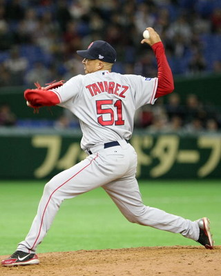 TOKYO - MARCH 23:  Pitcher Julian Tavarez #51 of Boston Red Sox  throws during a presason friendly between Boston Red Sox and Yomiuri Giants at Tokyo Dome on March 23, 2008 in Tokyo, Japan.  (Photo by Koichi Kamoshida/Getty Images)
