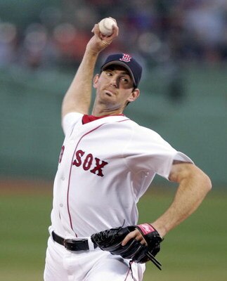 BOSTON - APRIL 13:  Matt Clement #30 of the Boston Red Sox delivers a pitch against the Toronto Blue Jays during their game at Fenway Park on April 13, 2006 in Boston, Massachusetts.  (Photo by Jim McIsaac/Getty Images)