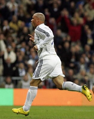 MADRID, SPAIN - DECEMBER 03:  Ronaldo of Real Madrid celebrates after he scored a goal against Athletic Bilbao during their Primera Liga match at the Santiago Bernabeu stadium on December 3, 2006 in Madrid, Spain.  (Photo by Denis Doyle/Getty Images)