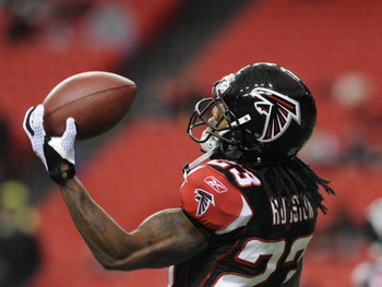 ATLANTA - DECEMBER 14: Cornerback Chris Houston #23 of the Atlanta Falcons grabs a warm-up pass before play against the Tampa Bay Buccaneers at the Georgia Dome on December 14, 2008 in Atlanta, Georgia. (Photo by Al Messerschmidt/Getty Images)