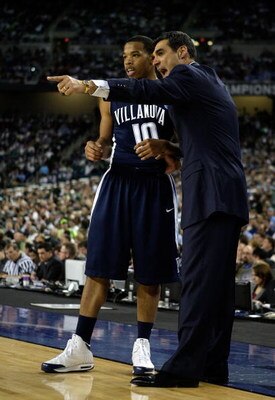 DETROIT - APRIL 04:  Head coach Jay Wright of the Villanova Wildcats gestures as he talks with Corey Fisher #10 in the first half against the North Carolina Tar Heels during the National Semifinal game of the NCAA Division I Men's Basketball Championship 
