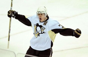 RALEIGH, NC - MAY 23:  Evgeni Malkin #71 of the Pittsburgh Penguins reacts after scoring a goal against the Carolina Hurricanes during Game Three of the Eastern Conference Championship Round of the 2009 Stanley Cup Playoffs at RBC Center on May 23, 2009 i