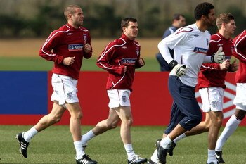 LONDON COLNEY, ENGLAND - MARCH 24:  (L-R) Matthew Upson, Leighton Baines, David James and Steve Gerrard of England in action during an England training session at London Colney on March 24, 2009 London, England.  (Photo by Phil Cole/Getty Images)