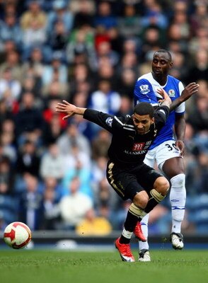 BLACKBURN, UNITED KINGDOM - APRIL 04:  Aaron Lennon of Tottenham Hotspur battles with Jason Roberts of Blackburn Rovers during the Barclays Premier League match between Blackburn Rovers and Tottenham Hotspur at Ewood Park on April 4, 2009 in Blackburn, En