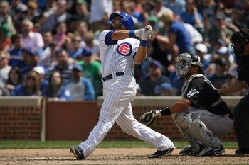 CHICAGO - MAY 2:  Geovany Soto #18 of the Chicago Cubs bats against the Florida Marlins during the game on May 2, 2009 at Wrigley Field in Chicago, Illinois. (Photo by Jonathan Daniel/Getty Images) 