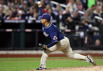 NEW YORK - APRIL 13:  Walter Silva #27 of the San Diego Padres pitches against the New York Mets on April 13, 2009 at Citi Field in the Flushing neighborhood of the Queens borough of New York City.This is the first regular season MLB game being played at 