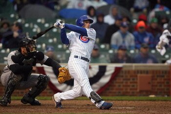 CHICAGO - APRIL 13:  Mike Fontenot #17 of the Chicago Cubs bats against the Colorado Rockies during the Opening Day game on April 13, 2009 at Wrigley Field in Chicago, Illinois. The Cubs defeated the Rockies 4-0. (Photo by Jonathan Daniel/Getty Images) 