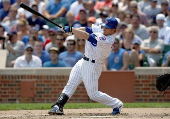 CHICAGO - JULY 26: Mike Fontenot #17 of the Chicago Cubs swings at the pitch during the game against the Florida Marlins on July 26, 2008 at Wrigley Field in Chicago, Illinois. The Marlins defeated the Cubs 3-2 in 12 innings. (Photo by Jonathan Daniel/Get