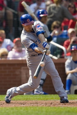 ST. LOUIS, MO - JULY 5: Ryan Theriot #2 of the Chicago Cubs hits an RBI single against the St. Louis Cardinals on July 5, 2008 at Busch Stadium in St. Louis, Missouri. The Cards defeated the Cubs 5-4.  (Photo by Dilip Vishwanat/Getty Images)
