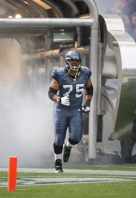 SEATTLE - OCTOBER 12:  Sean Locklear #75 of the Seattle Seahawks jogs out onto the field prior to the game against the Green Bay Packers on October 12, 2008 at Qwest Field in Seattle, Washington. The Packers defeated the Seahawks 27-17. (Photo by Otto Gre