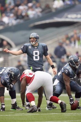 SEATTLE - NOVEMBER 16:  Quarterback Matt Hasselbeck #8 of the Seattle Seahawks calls the play at the line of scrimmage during the game against the Arizona Cardinals on November 16, 2008 at Qwest Field in Seattle, Washington. (Photo by Otto Greule Jr/Getty
