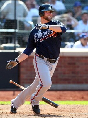 NEW YORK - MAY 13:  Brian McCann #16 of the Atlanta Braves bats against the New York Mets on May 13, 2009 at Citi Field in the Flushing neighborhood of the Queens borough of New York City. The Braves defeated the Mets 8-7 in twelve innings.  (Photo by Jim