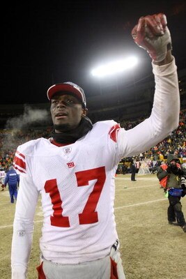 GREEN BAY, WI - JANUARY 20:  Wide receiver Plaxico Burress #17 of the New York Giants celebrates after winning the NFC championship game against the Green Bay Packers on January 20, 2008 at Lambeau Field in Green Bay, Wisconsin.   The Giants defeated the 