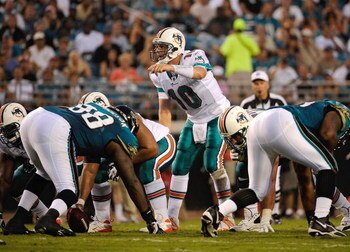 JACKSONVILLE, FL - AUGUST 16: Quarterback Chad Pennington #10 of the Miami Dolphins calls a signal in a game against the Jacksonville Jaguars at Jacksonville Municipal Stadium on August 16, 2008 in Jacksonville, Florida.  (Photo by Sam Greenwood/Getty Ima