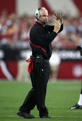 GLENDALE, AZ - JANUARY 03:  Head coach Mike Smith of the Atlanta Falcons calls a time out during the NFC Wild Card Game against the Arizona Cardinals on January 3, 2009 at University of Phoenix Stadium in Glendale, Arizona.  (Photo by Jed Jacobsohn/Getty 