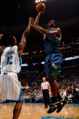 NEW ORLEANS - FEBRUARY 08:  Al Jefferson #25 of the Minnesota Timberwolves  makes a shot over Hilton Armstrong #12 of the New Orleans Hornets on February 8, 2009 in New Orleans, Louisiana.  NOTE TO USER: User expressly acknowledges and agrees that, by dow